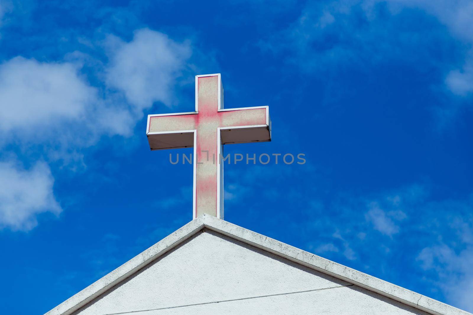 Faded cross on church roof by imagesbykenny