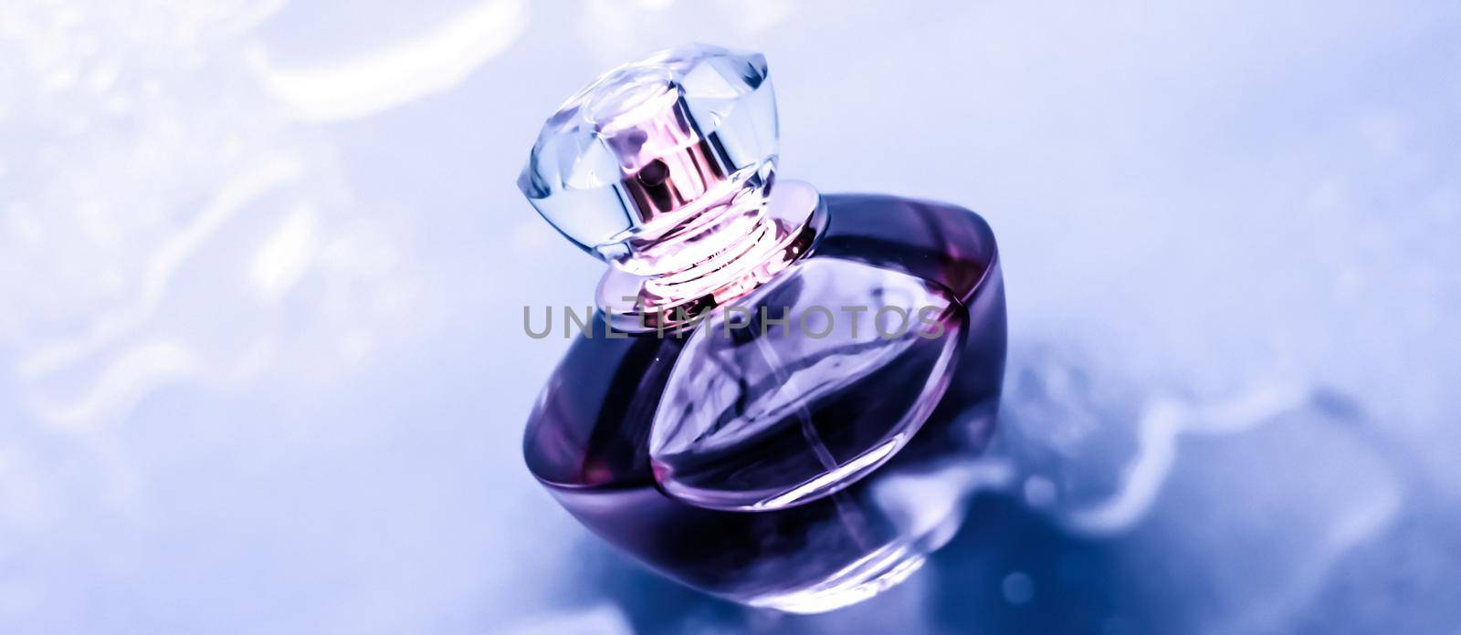 Perfume bottle under purple water, fresh sea coastal scent as glamour fragrance and eau de parfum product as holiday gift, luxury beauty spa brand present by Anneleven