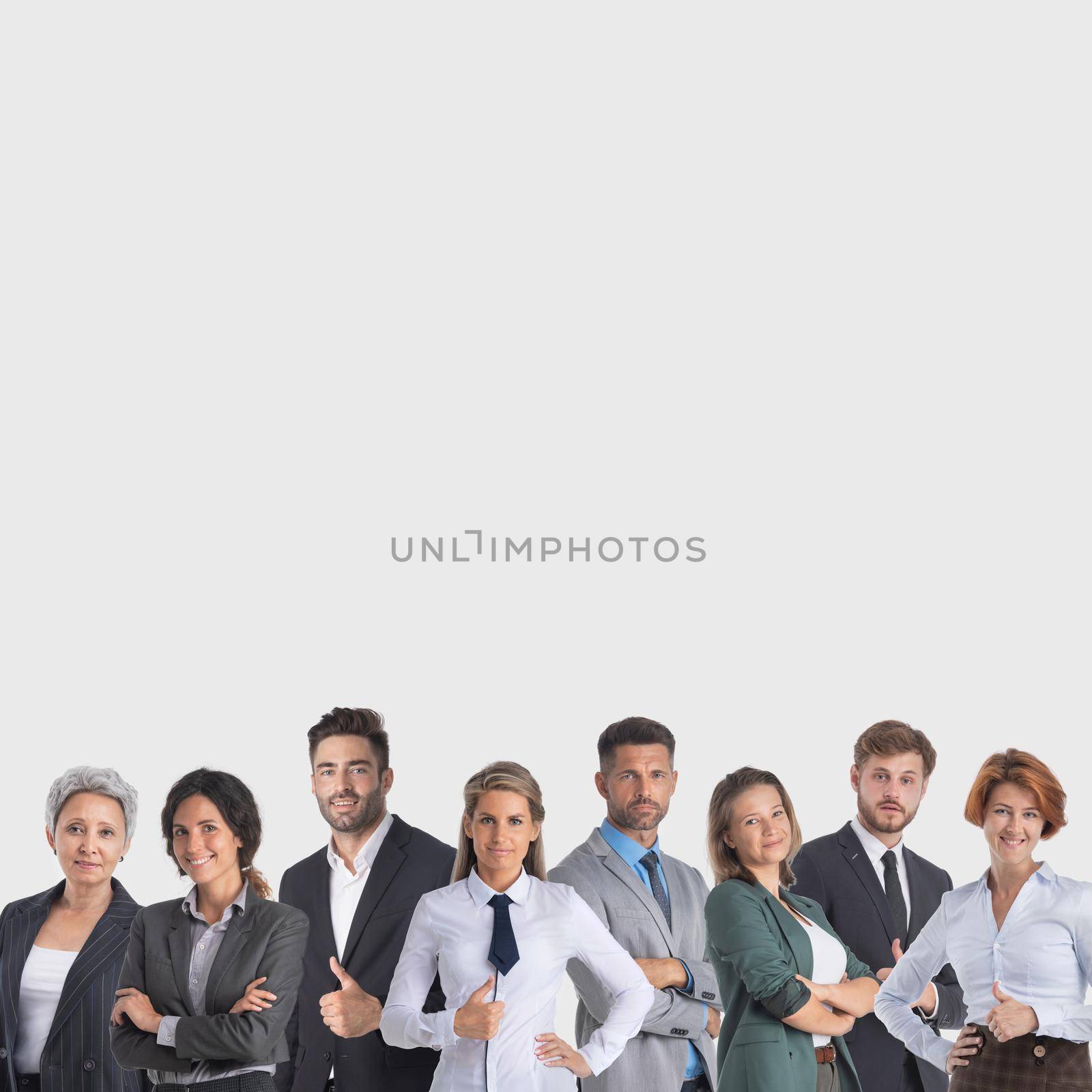 Group happy colleagues business team on gray background with copy space for text