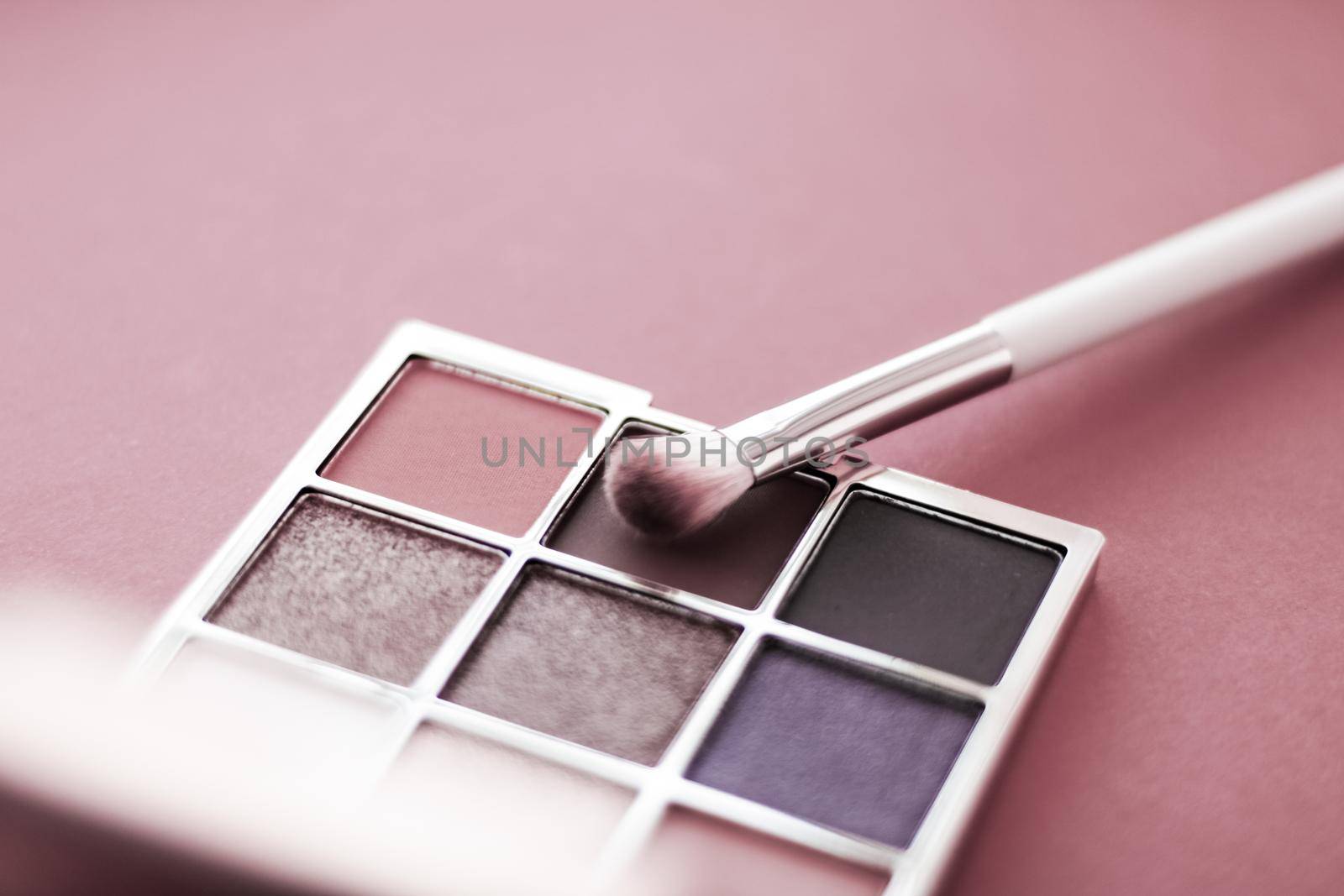 Cosmetic branding, mua and girly concept - Eyeshadow palette and make-up brush on rouge background, eye shadows cosmetics product for luxury beauty brand promotion and holiday fashion blog design