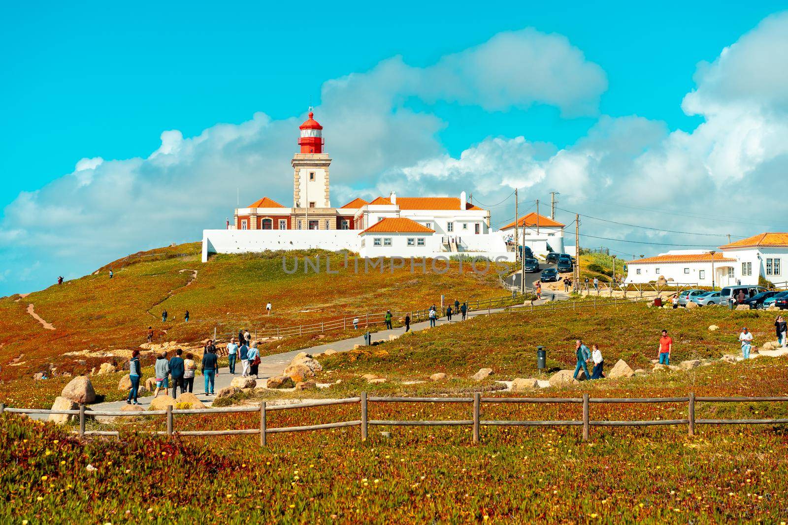 Portugal, Sintra, May 2022 View of the Cabo da Roca Lighthouse. Sintra, Portugal. Portuguese Farol de Cabo da Roca is a cape which forms the westernmost point Eurasian land mass. Sunny summer day