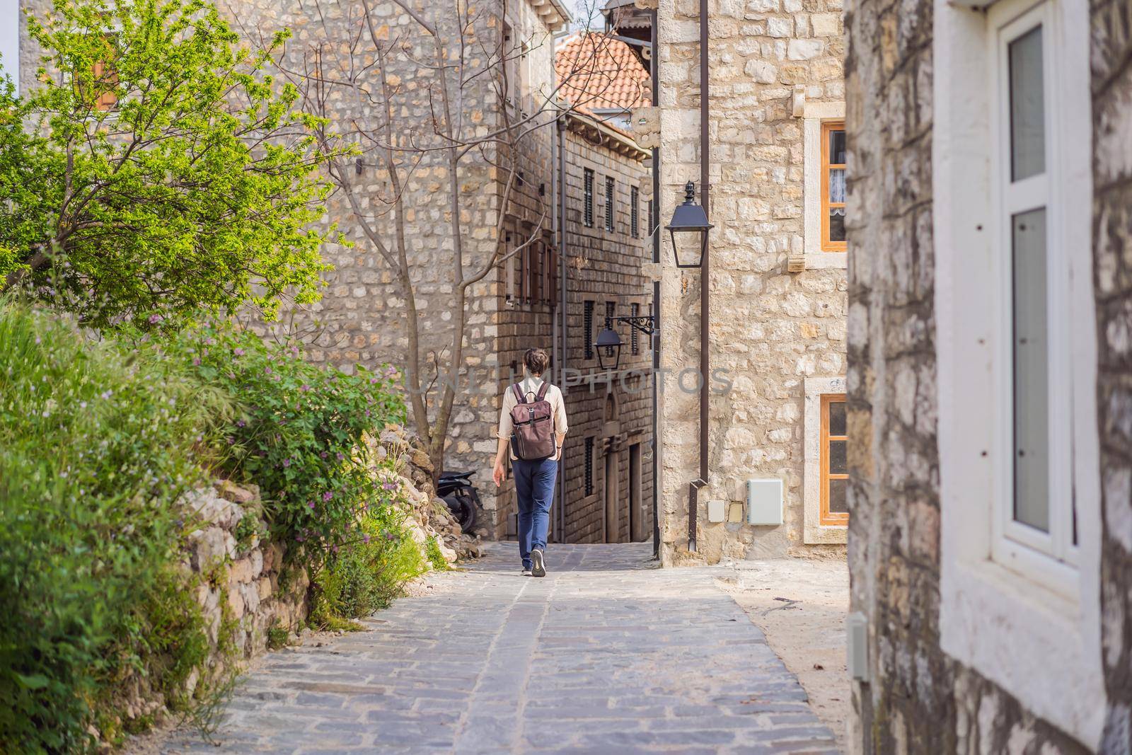 The man in Ulcinj town in Montenegro. Clock Tower of Ulcinj Sahat Kulla. Lami Mosque. Ulcinj is a popular tourist destination in the summer on the southern Adriatic coast of Montenegro. Ulqin.