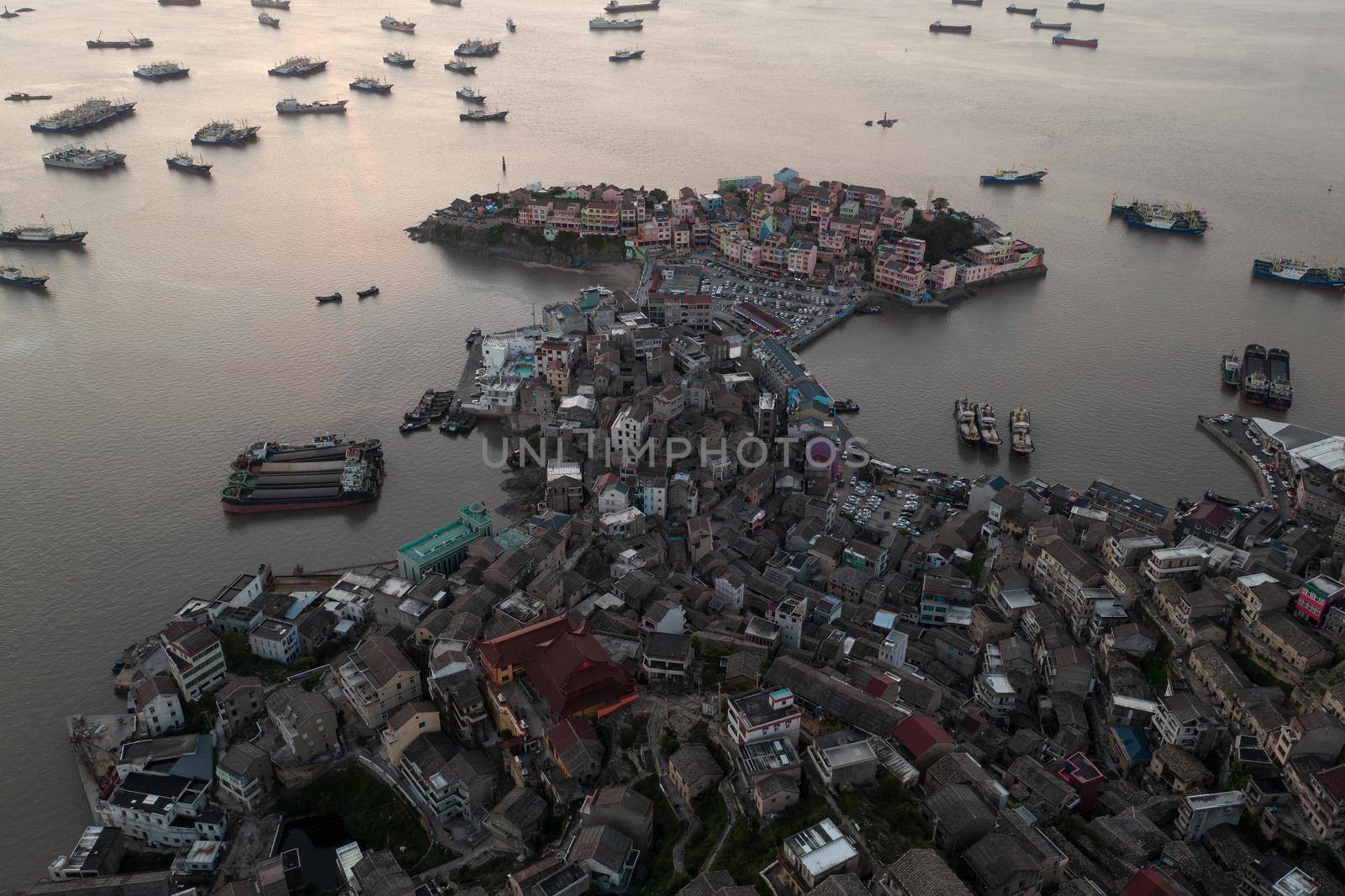Seaside port with residental houses around, in Taizhou, Zhejiang, China.