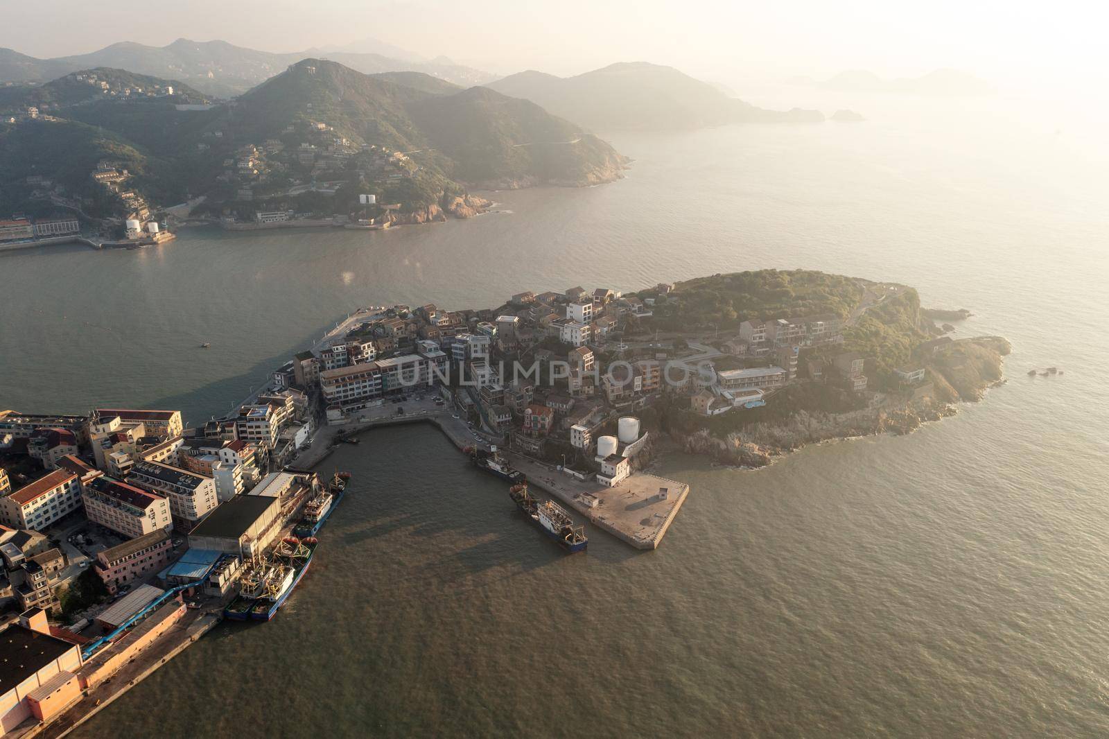Seaside port with residental houses around, in Taizhou, Zhejiang. by vinkfan