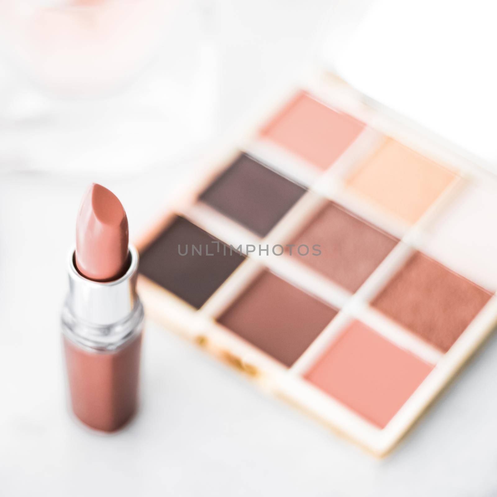 Cosmetic branding, girly and glamour concept - Cosmetics, makeup products on dressing vanity table, lipstick, foundation base, nailpolish and eyeshadows for luxury beauty and fashion brand ads design