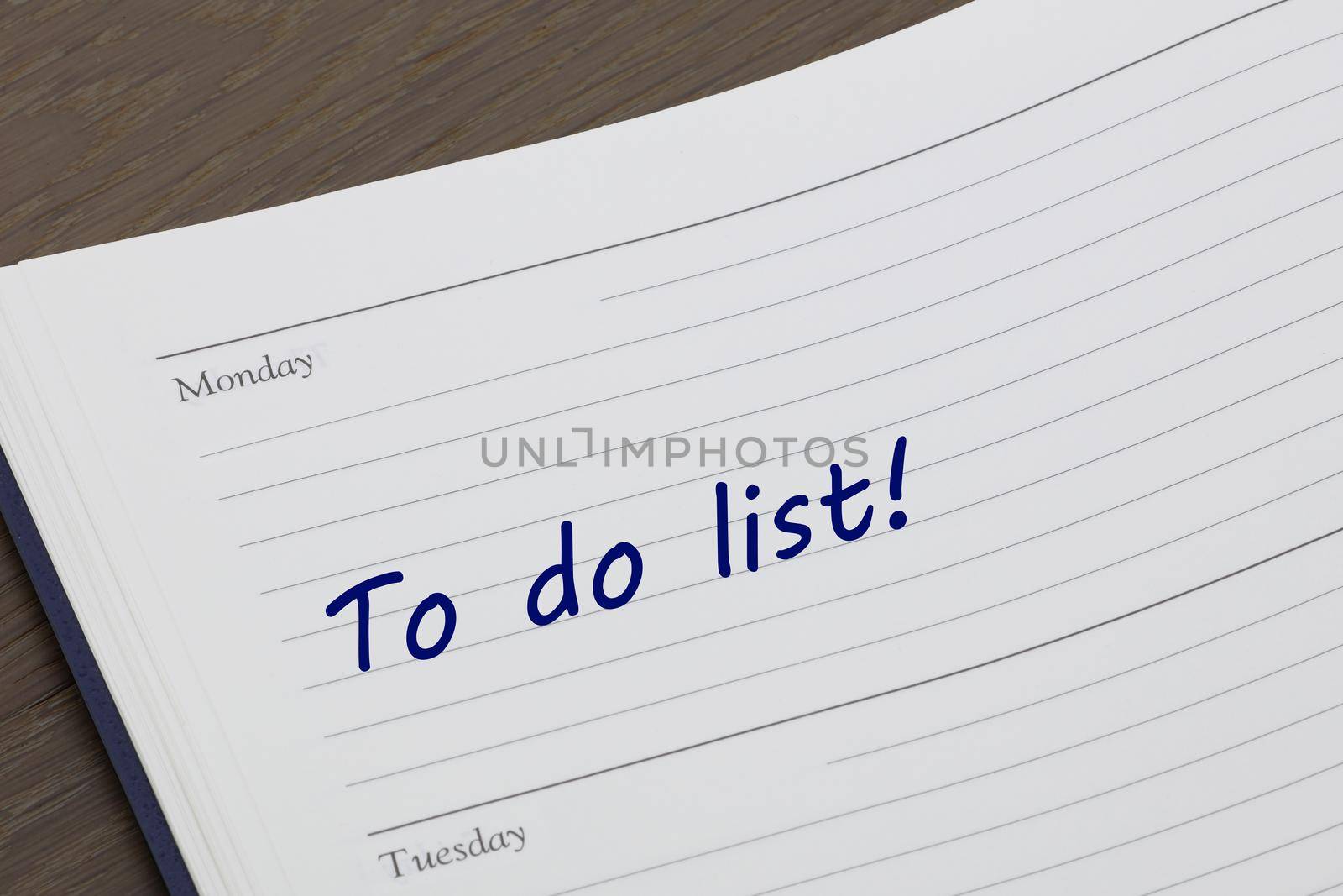 A To do list diary reminder open on desk