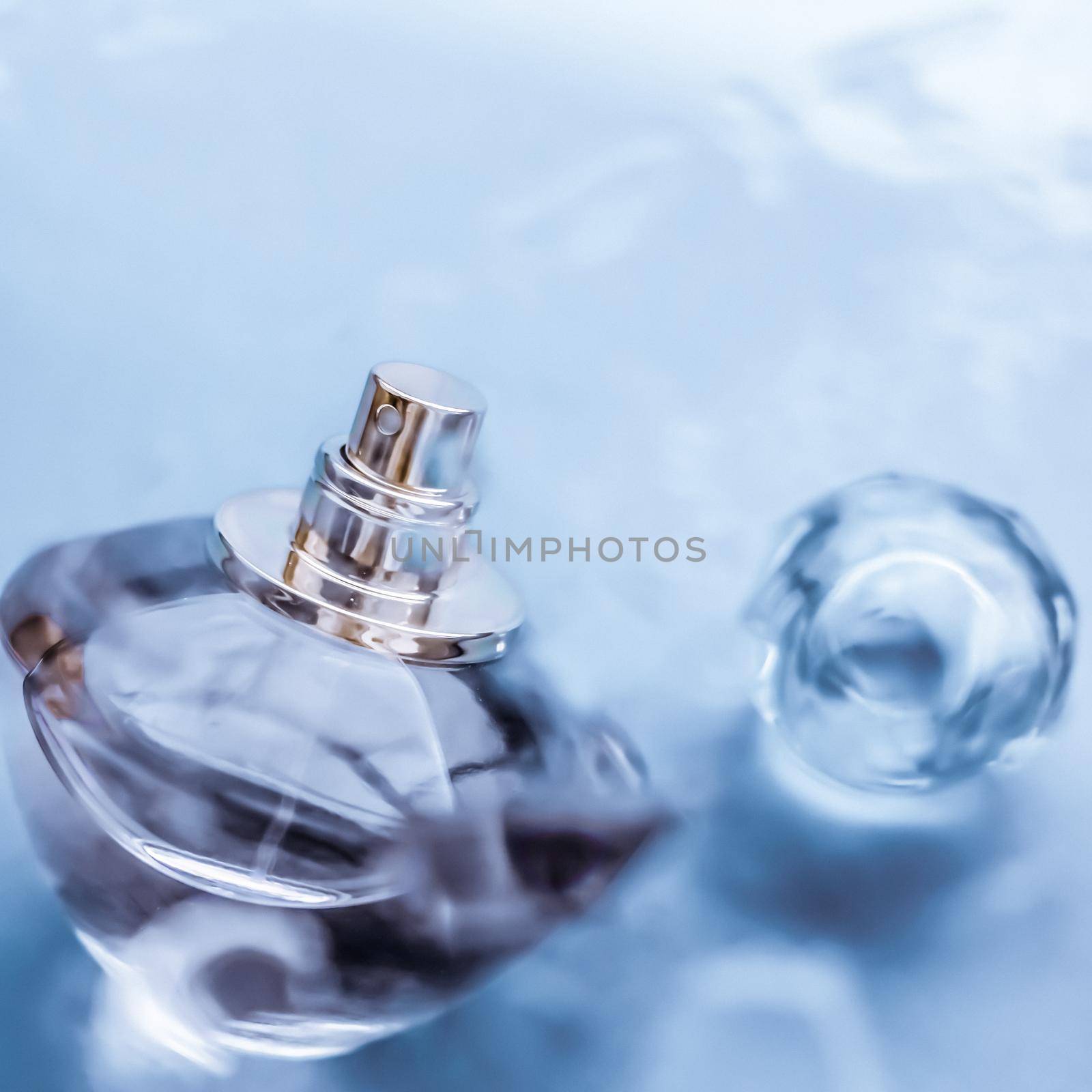 Perfumery, cosmetics and branding concept - Perfume bottle under blue water, fresh sea coastal scent as glamour fragrance and eau de parfum product as holiday gift, luxury beauty spa brand present