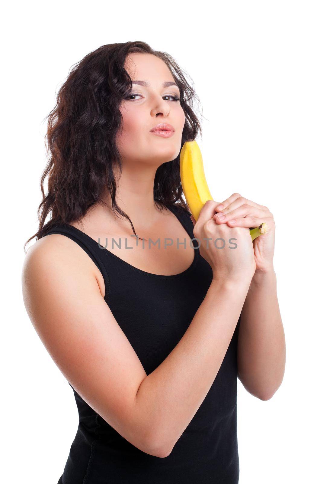 Beauty young woman with banana gun isolated