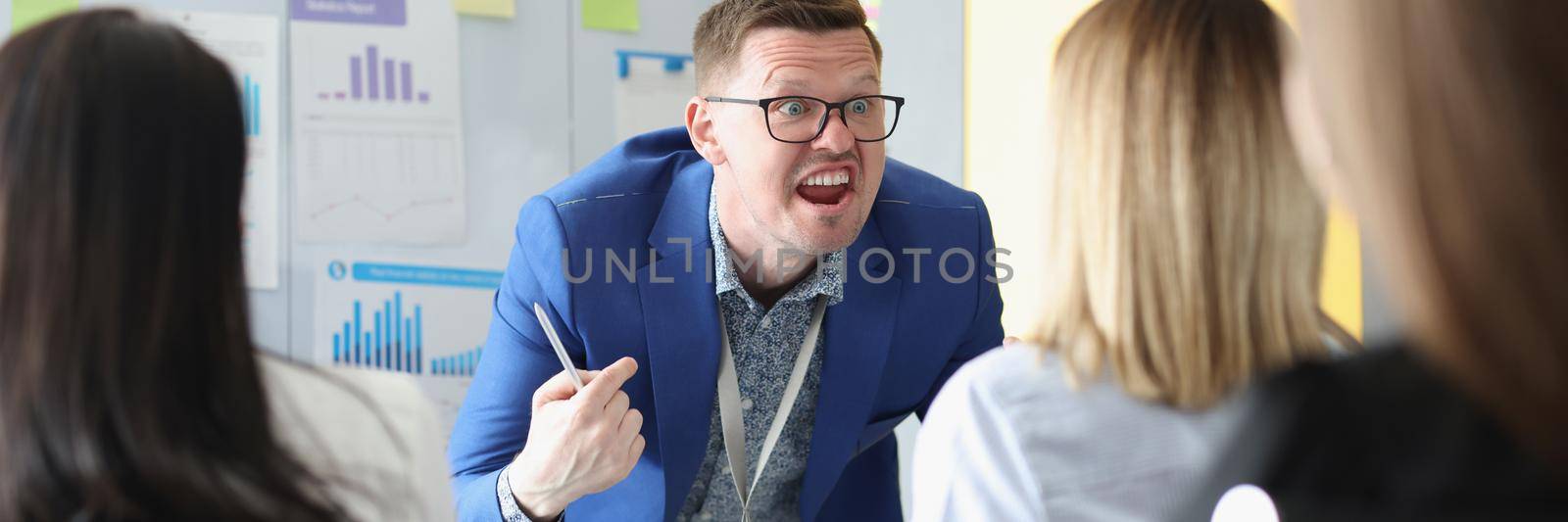 Portrait of serious man scream on training session, passionate speech with bright emotions. Training for company workers, skills development, class concept