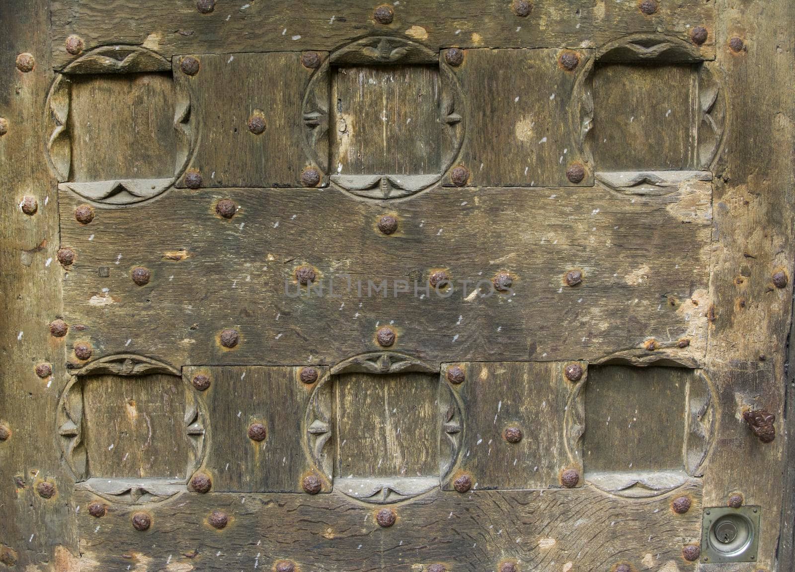 Wooden door with ancient square patten. Wood carving technic.