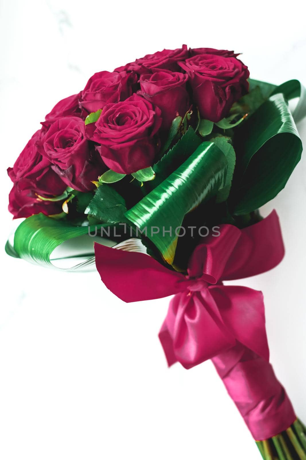 Gift for her, romantic relationship and floral design concept - Luxury bouquet of burgundy roses on marble background, beautiful flowers as holiday love present on Valentines Day