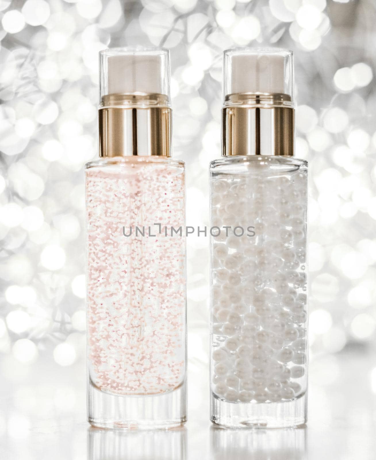 Cosmetic branding, blank label and glamour present concept - Holiday make-up base gel, serum emulsion, lotion bottle and silver glitter, luxury skin and body care cosmetics for beauty brand ads