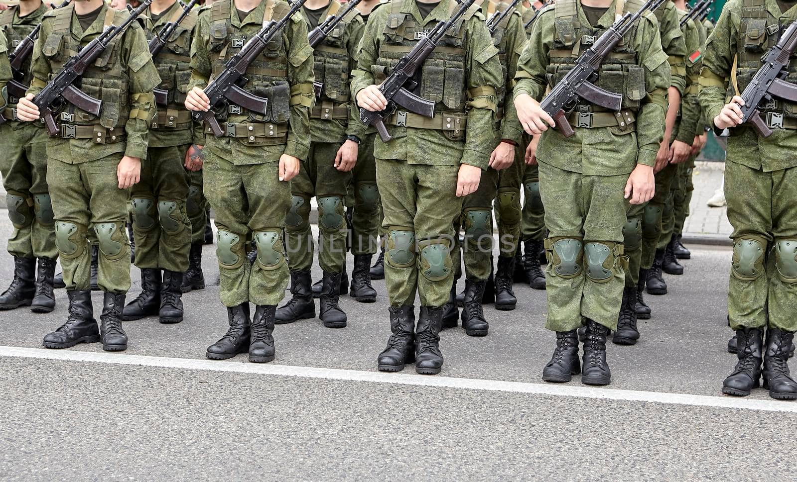 Soldiers in military camouflage uniforms in army formation. Belarusian troops during the parade.