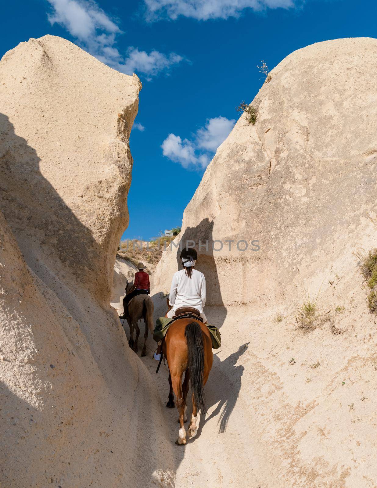 young woman during vacation in Turkey Kapadokya watching the hot air balloons of Cappadocia by fokkebok