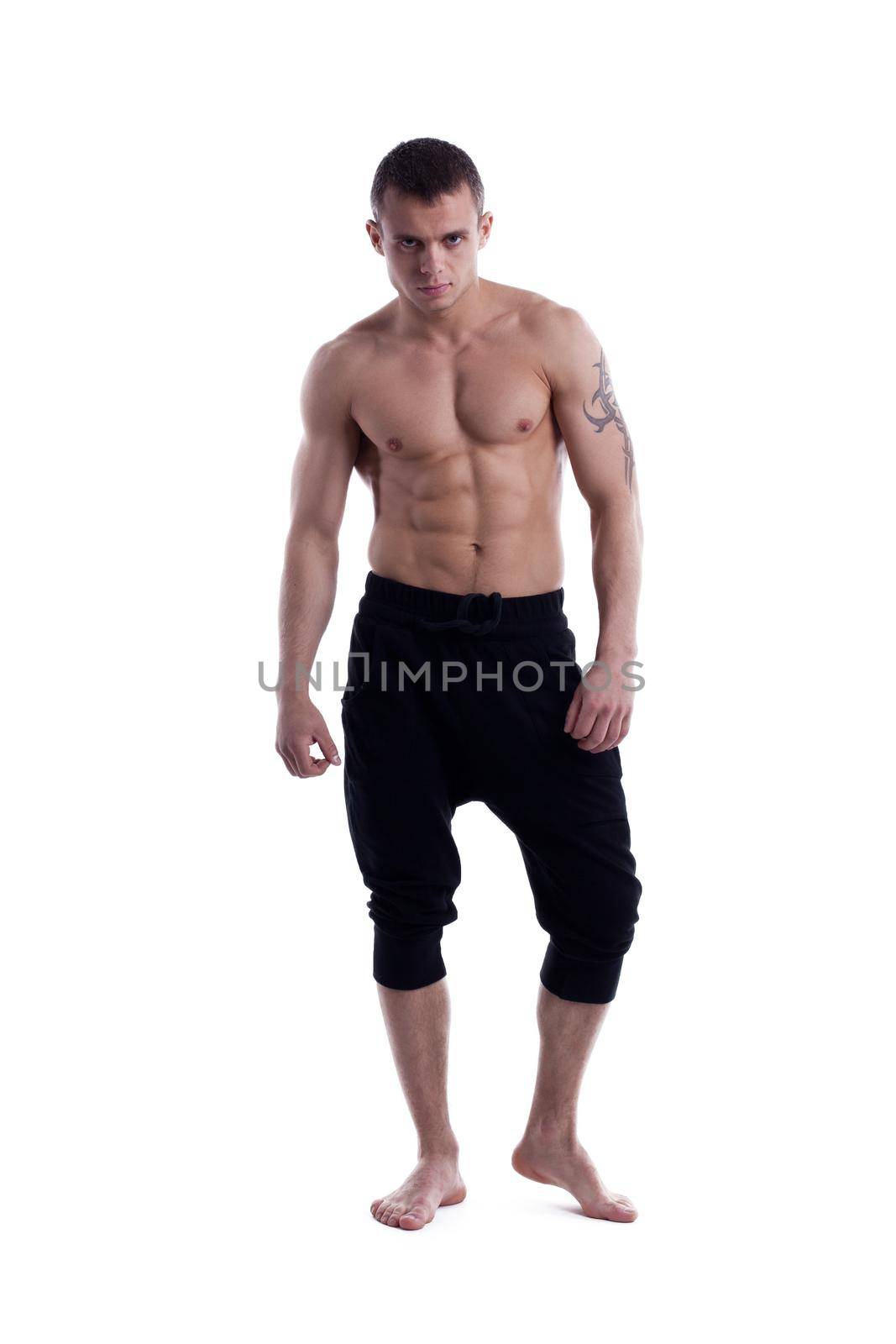 Young man naked torso. Full length portrait. Isolated on white