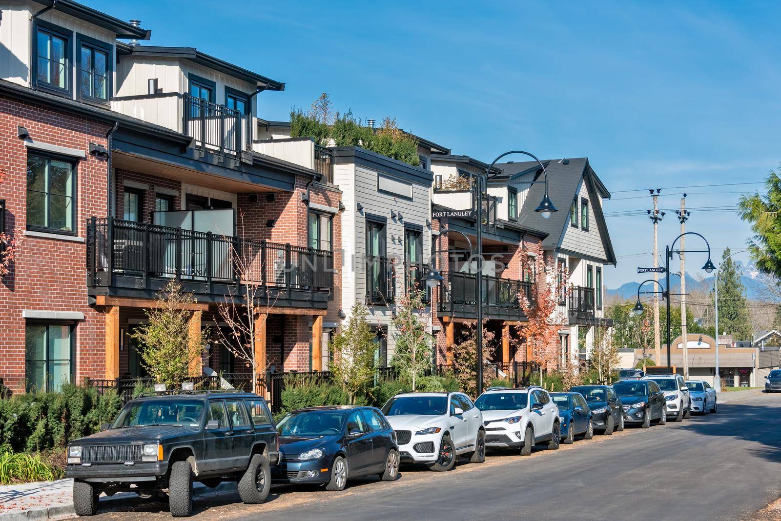 Street of townhomes on autumn season in British Columbia.