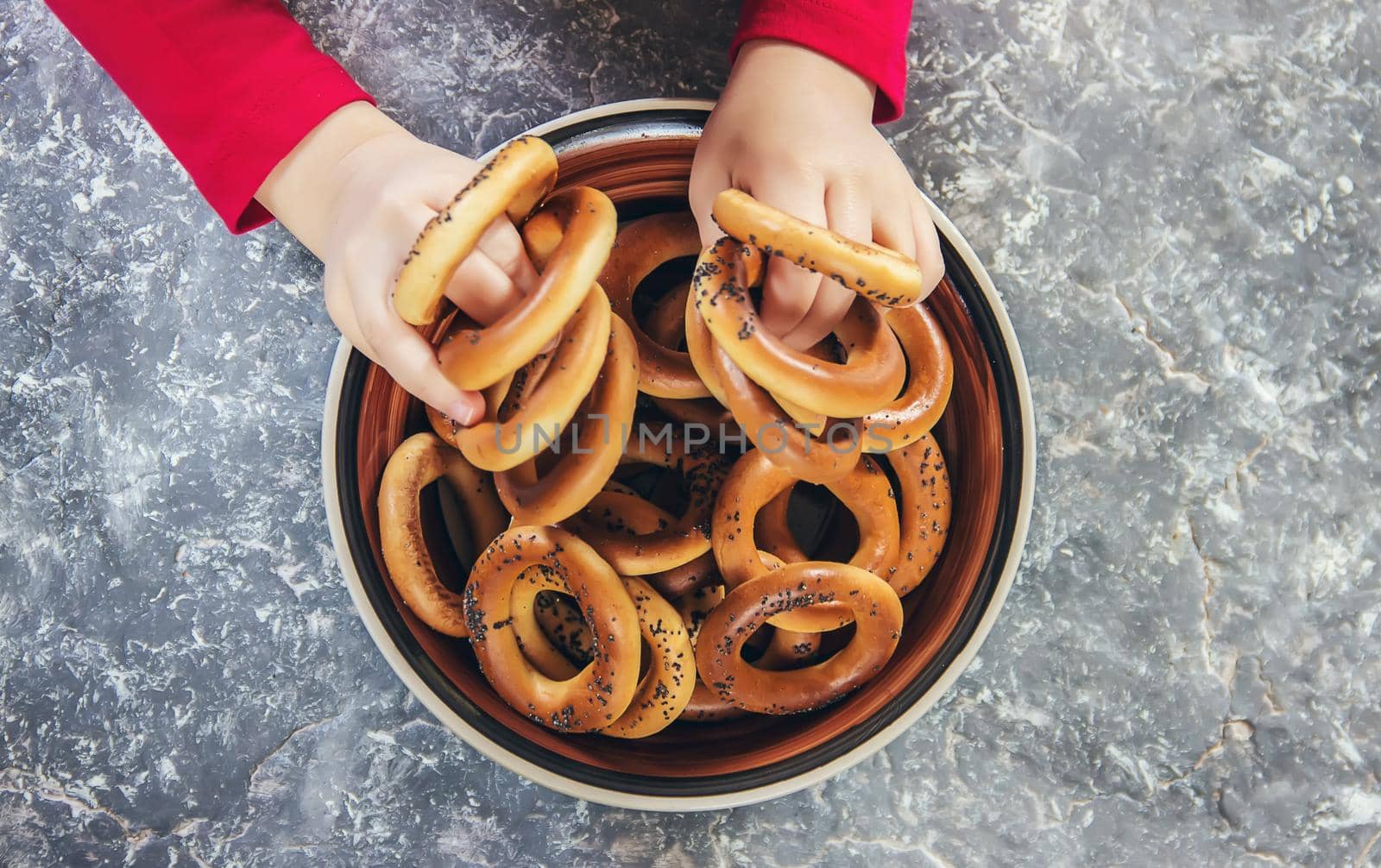 plate with bagels. Selective focus. by yanadjana