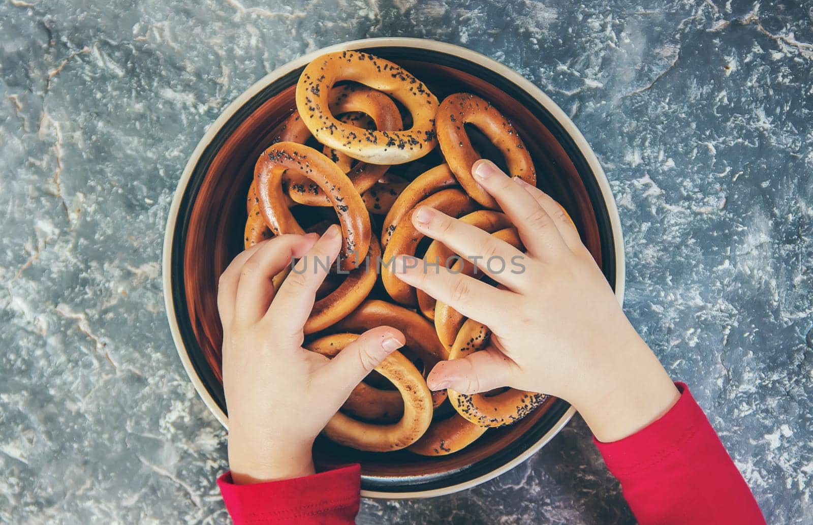 plate with bagels. Selective focus. by yanadjana