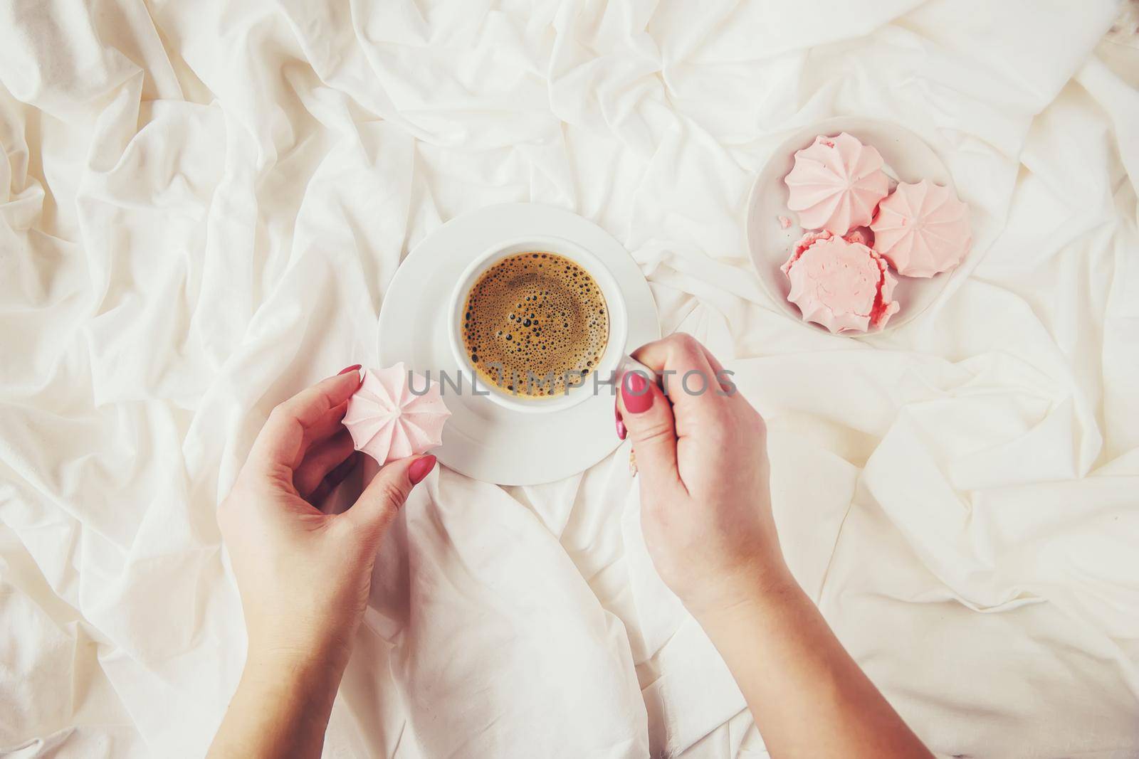 Coffee in bed. Selective focus. Love drink. by yanadjana