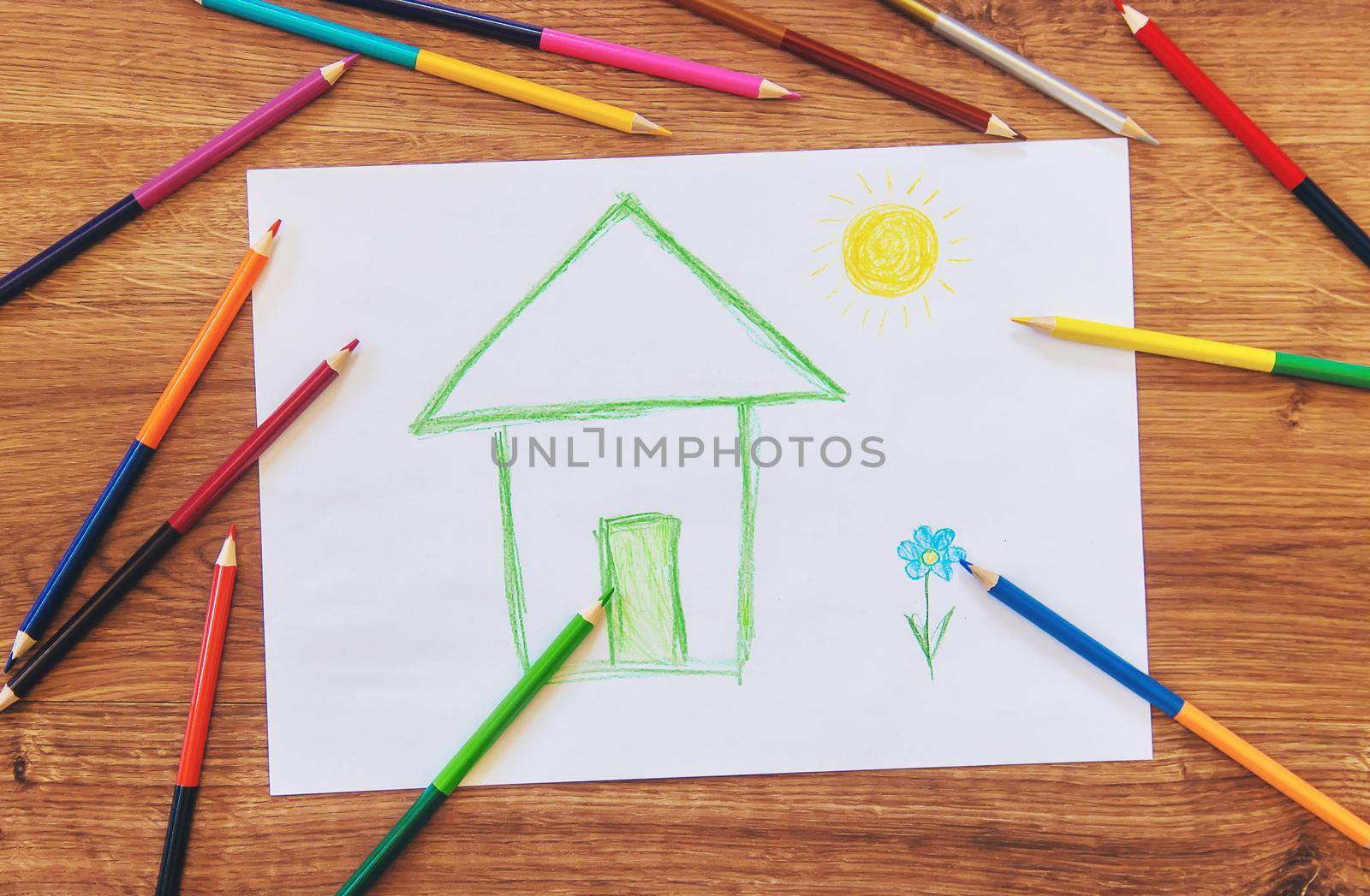 draw child house family. Selective focus. by yanadjana