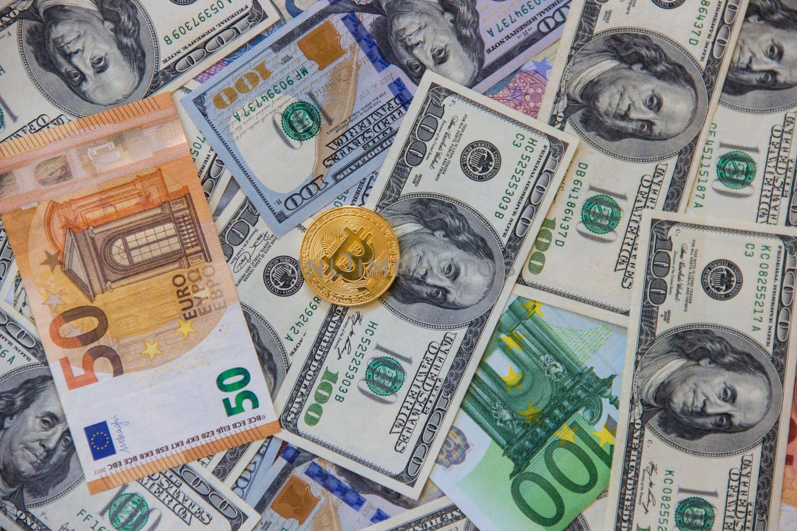 Bitcoin dollars and euro. Selective focus. by yanadjana