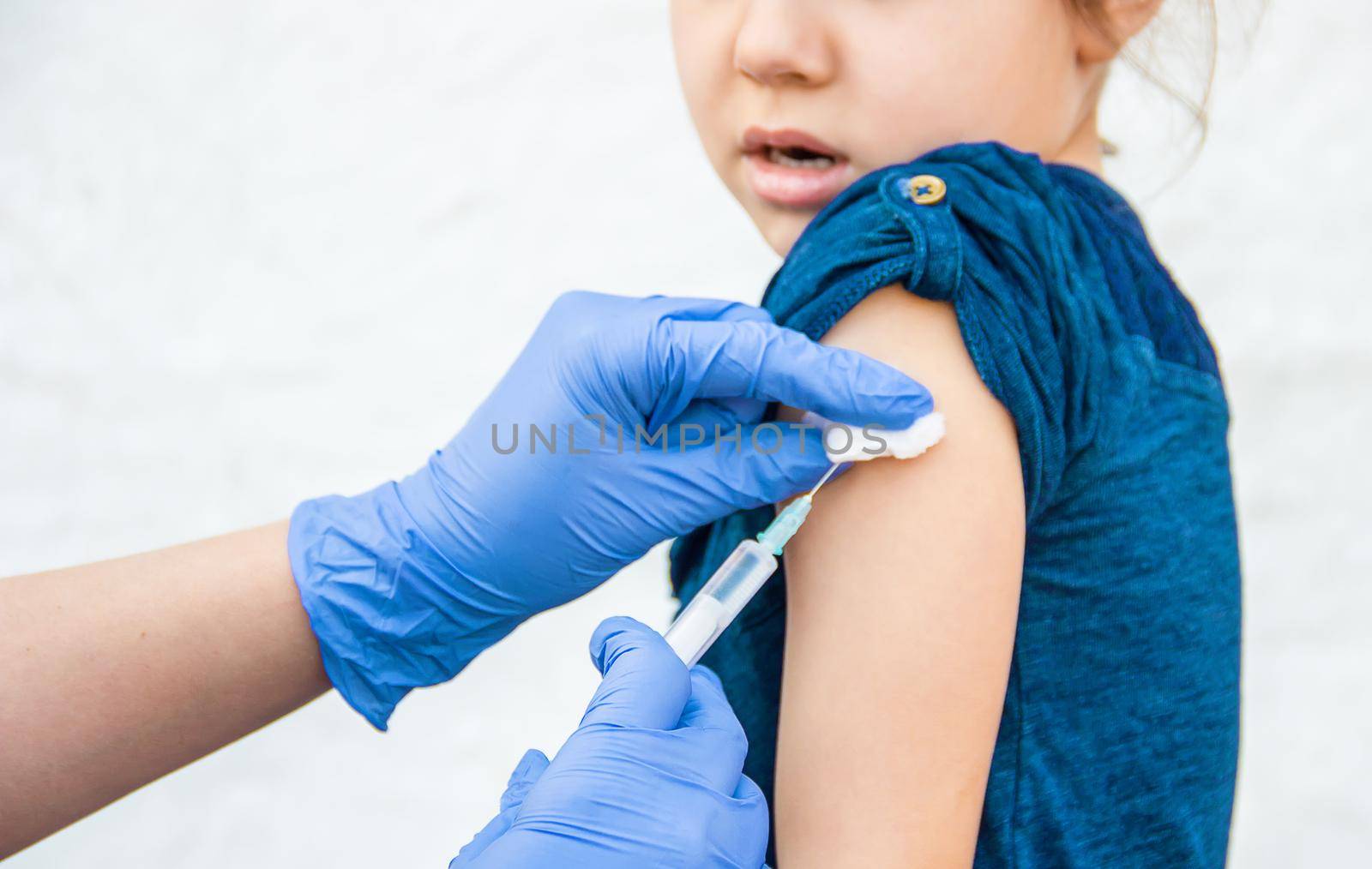 vaccination of children. An injection. Selective focus. by yanadjana