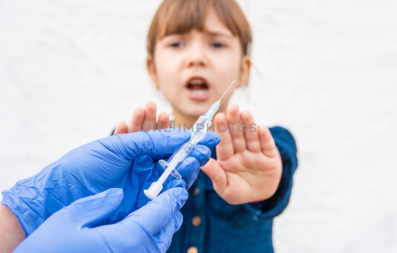 vaccination of children. An injection. Selective focus. by yanadjana