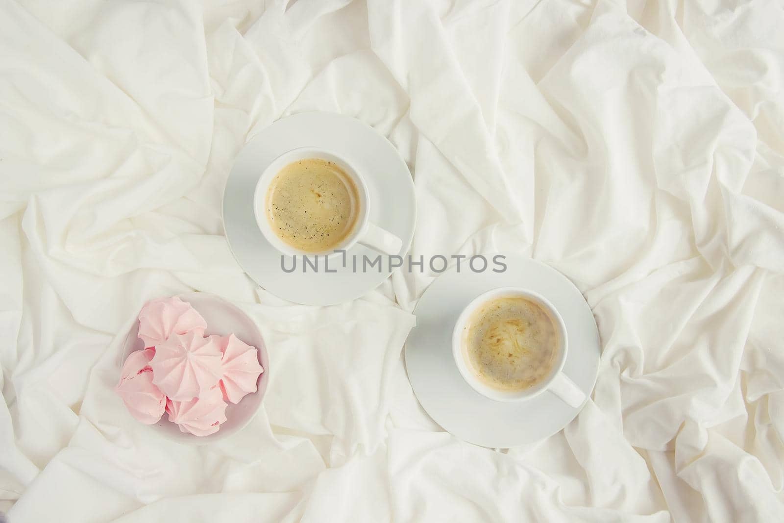 Coffee in bed. Selective focus. Love drink.