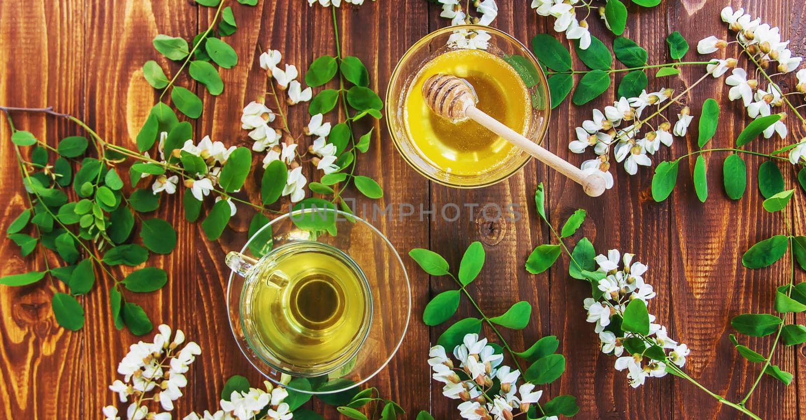 Honey with acacia and tea. Selective focus.