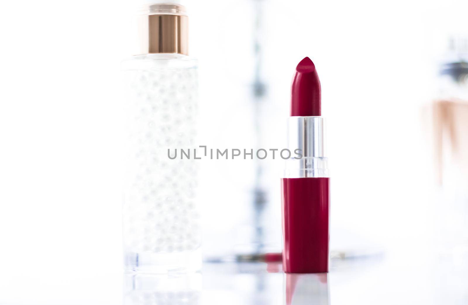 Cosmetic branding, girly and glamour concept - Cosmetics, makeup products on dressing vanity table, lipstick, foundation base, nailpolish and eyeshadows for luxury beauty and fashion brand ads design