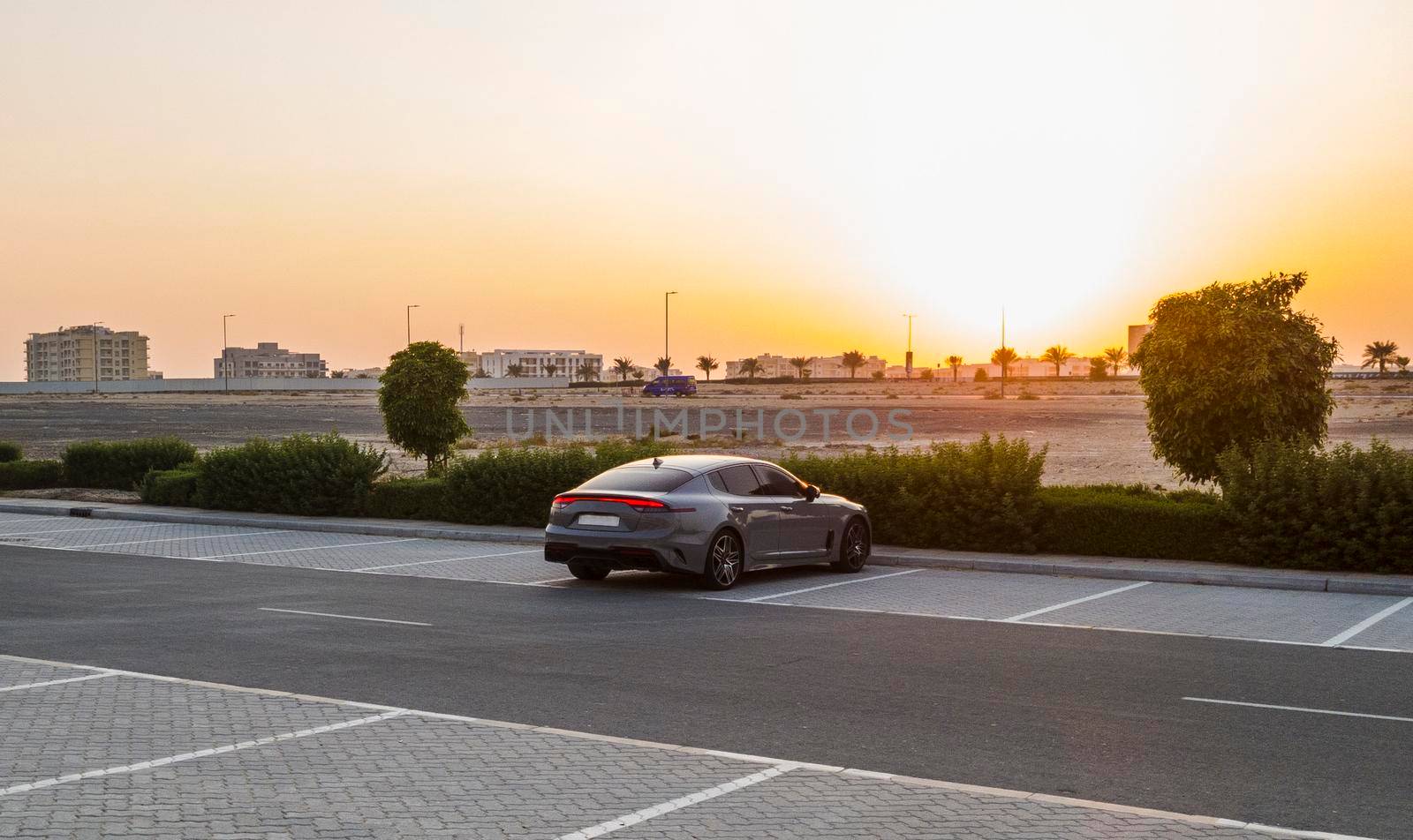 Shot of a car on the parking during sunset