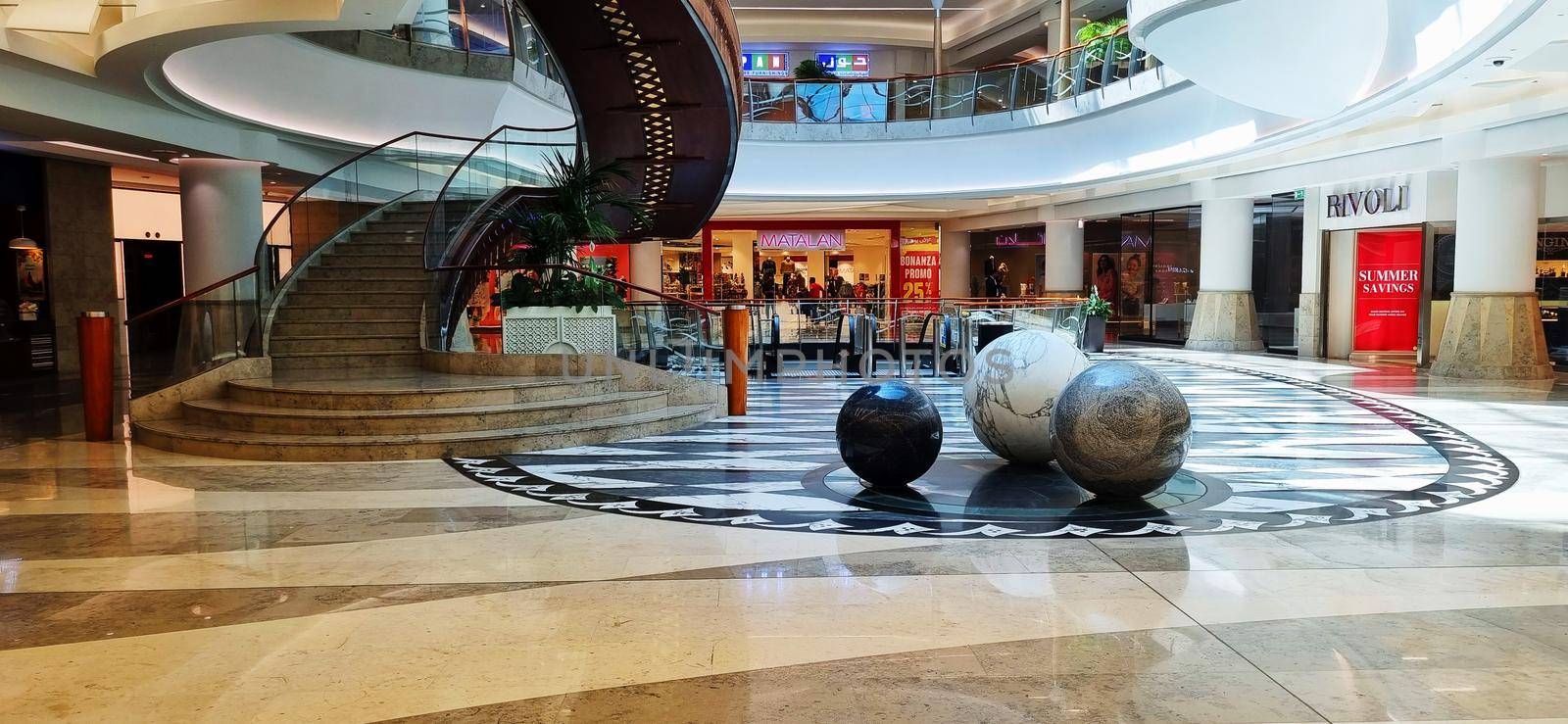 Dubai, UAE - 09.26.2022 - Staircase in the lobby of the Burjman shopping mall.