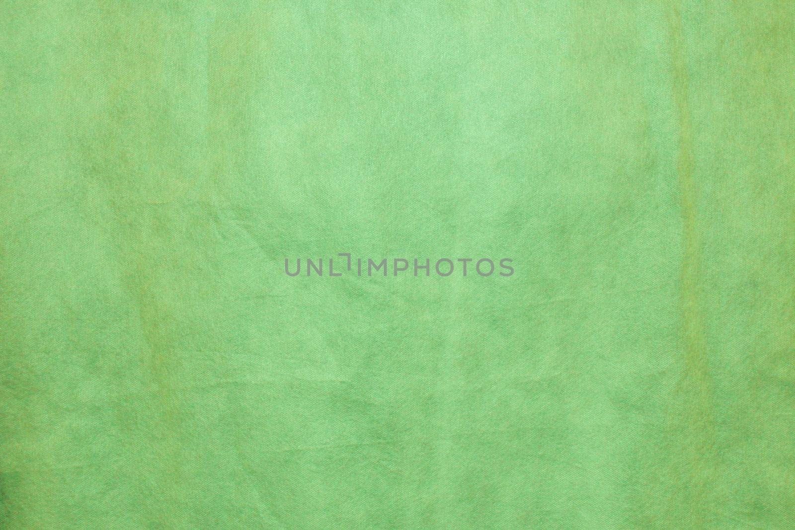 Green color felt textile fabric material texture background. by gelog67