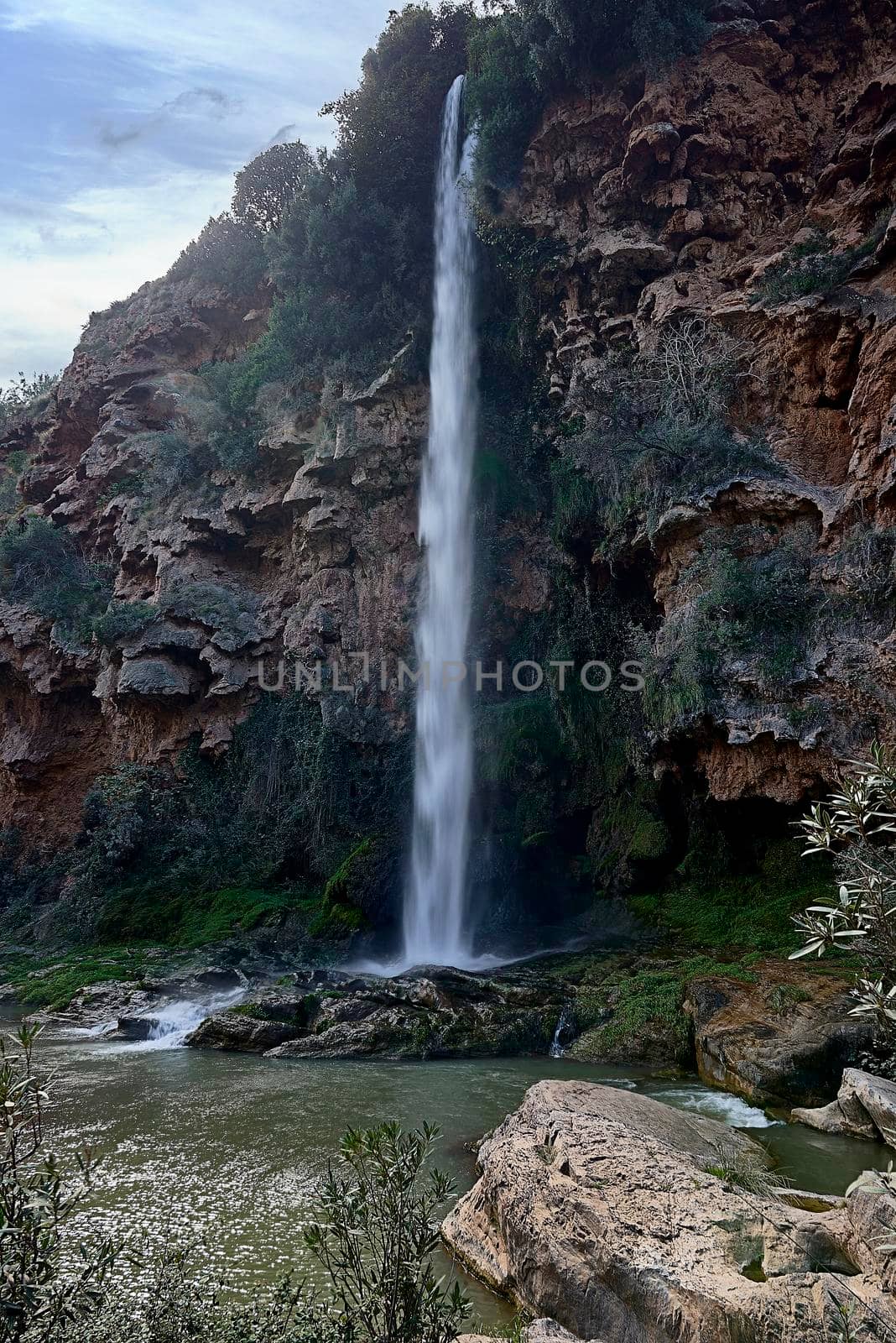 A large waterfall on a sunny day. Sato de la Novia.Navajas by raul_ruiz