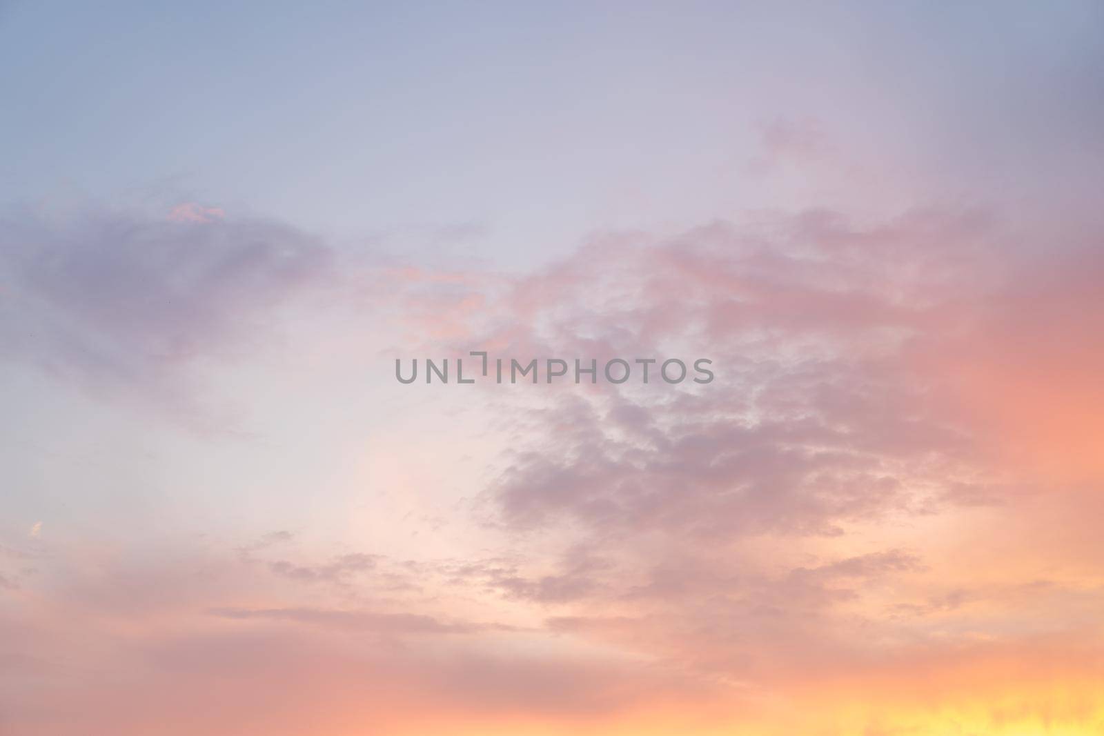 Beautiful dramtic cloudy sky sunset background under sea water With yellow red colors