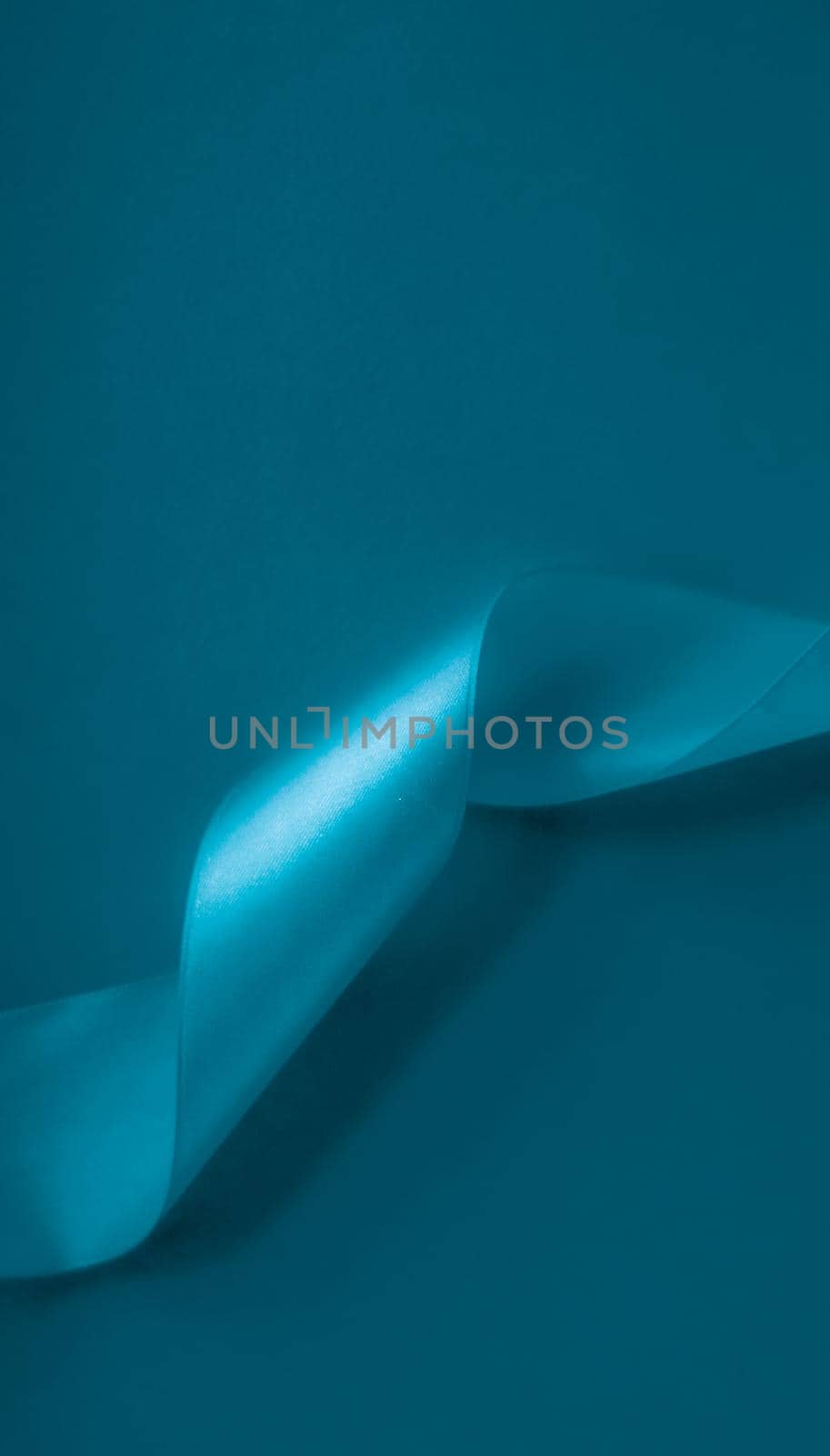 Branding, holidays and luxe brands concept - Abstract silk ribbon on aqua blue background, exclusive luxury brand design for holiday sale product promotion and glamour art invitation card backdrop