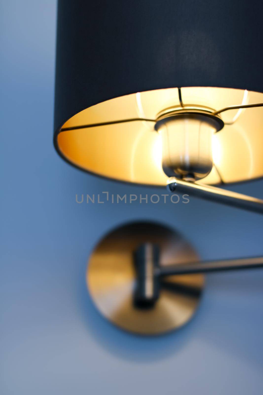 Interior design, indoor lamps and electricity concept - Golden lamp in a room, elegant modern home decor lighting