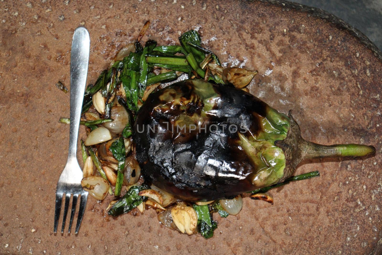 fresh and healthy fry brinjal with spice on kitchen