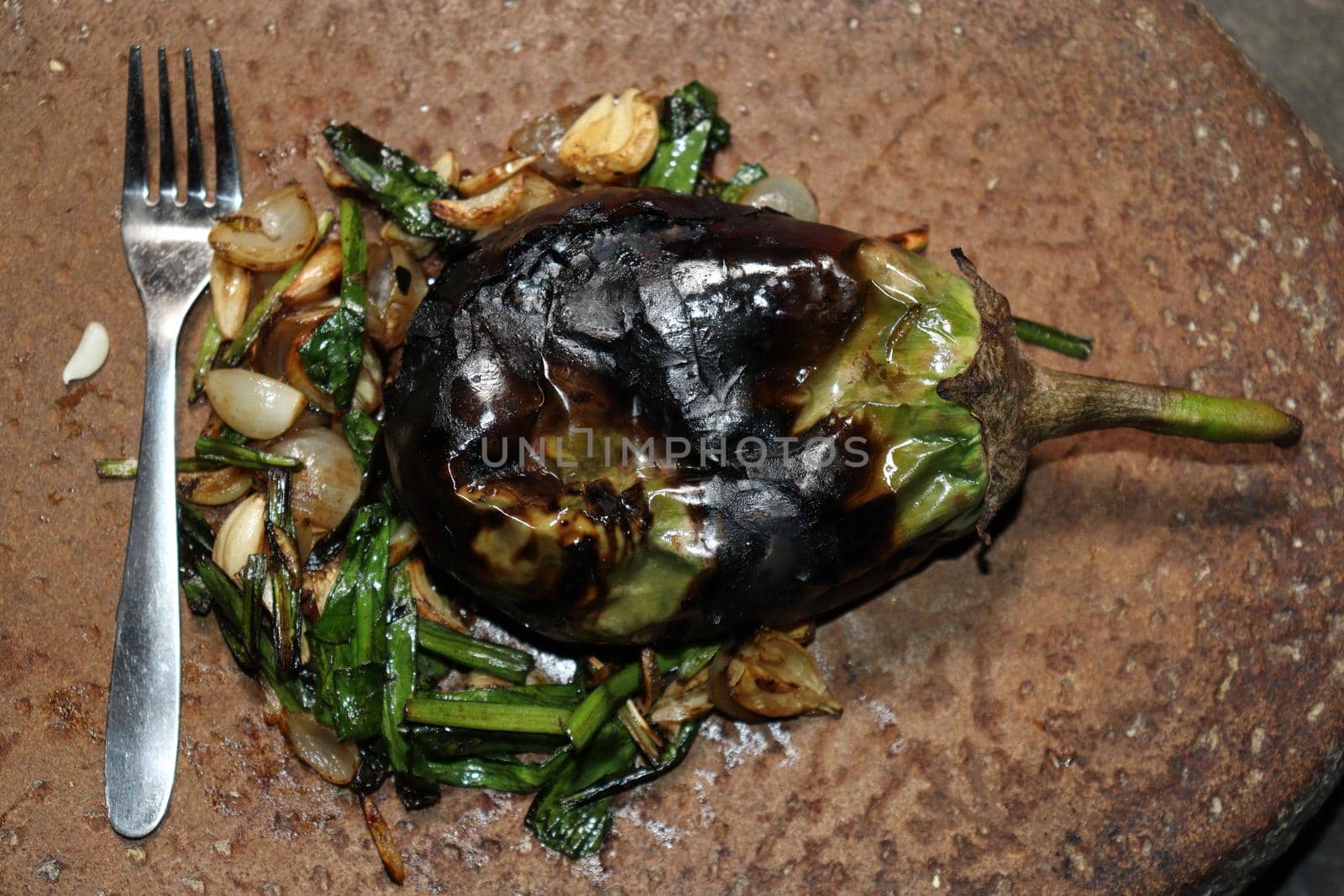 fresh and healthy fry brinjal with spice on kitchen