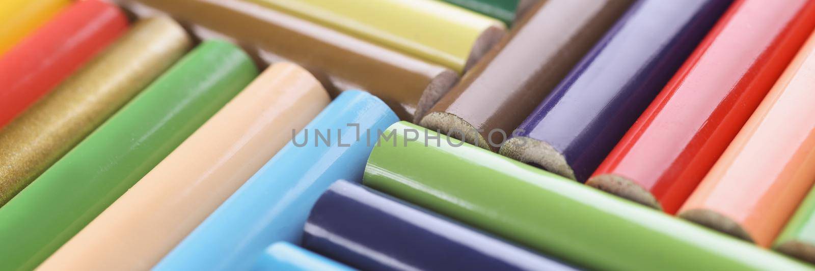 Close-up of bunch of colored pencils placed in creative order close to each other. All colours for bright imagination. Create masterpiece, idea concept