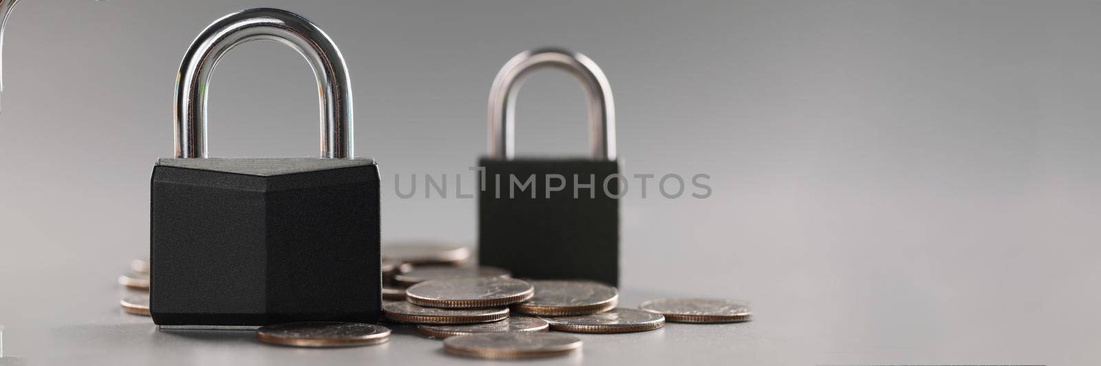 Combination padlock on coin money for financial security, symbol for protection finance by kuprevich