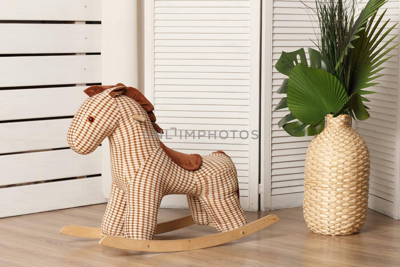 Brown rag horse for a rocking chair in the interior by lara29