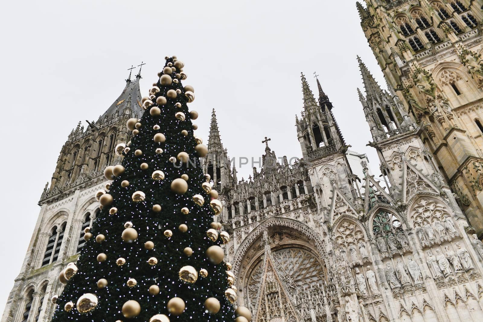 Decorated Christmas tree and cathedral at Rouen