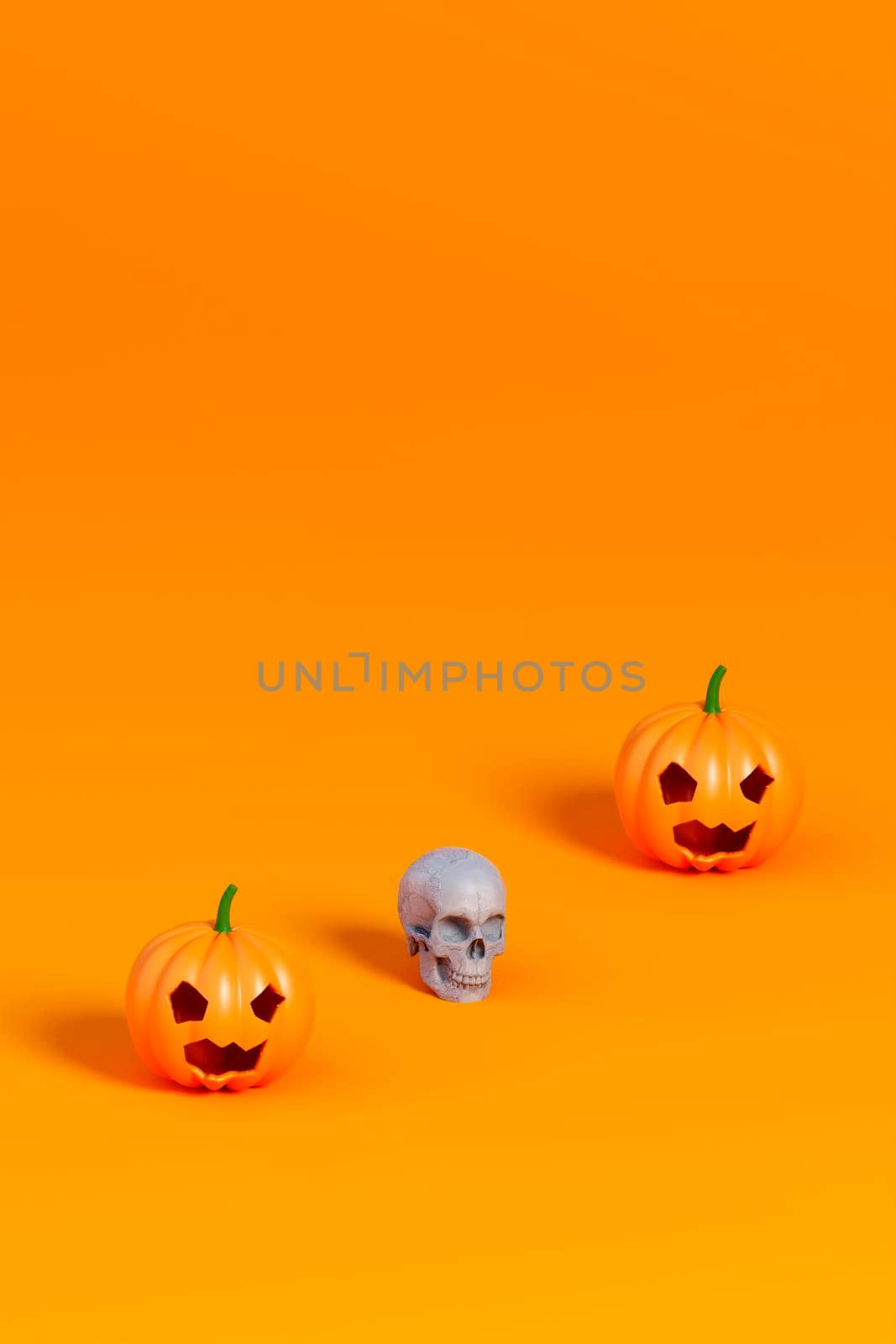 3d render of Halloween pumpkin and white skull on orange background