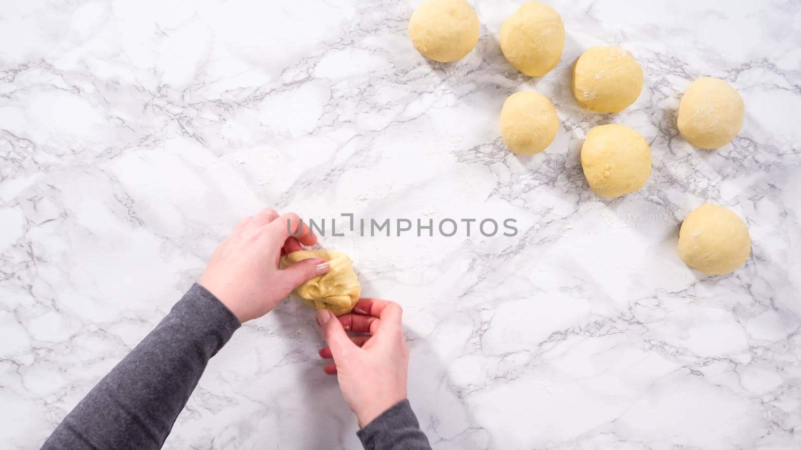 Flat lay. Step by step. Dividing bread dough to bake homemade brioche buns.