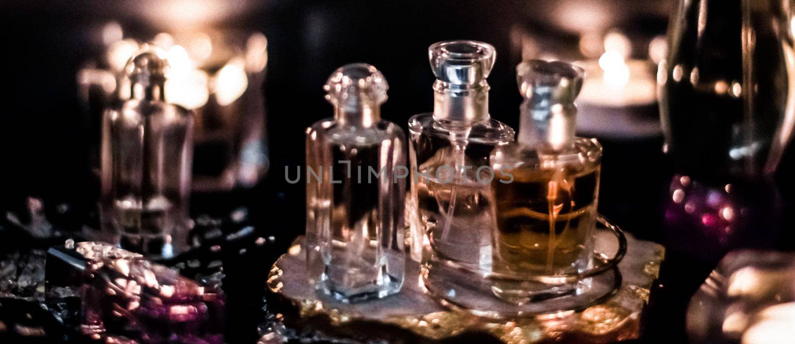 Perfume bottles and vintage fragrance at night, aroma scent, fragrant cosmetics and eau de toilette as luxury beauty brand, holiday fashion parfum design by Anneleven