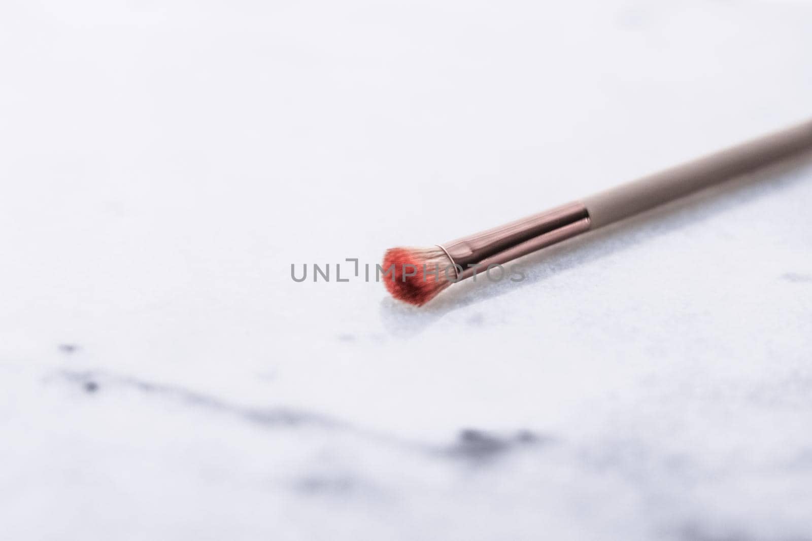 Cosmetic branding, blog and girly concept - Make-up brush for foundation base face contouring on marble background, mua cosmetics as glamour makeup artist product for luxury beauty brand art design