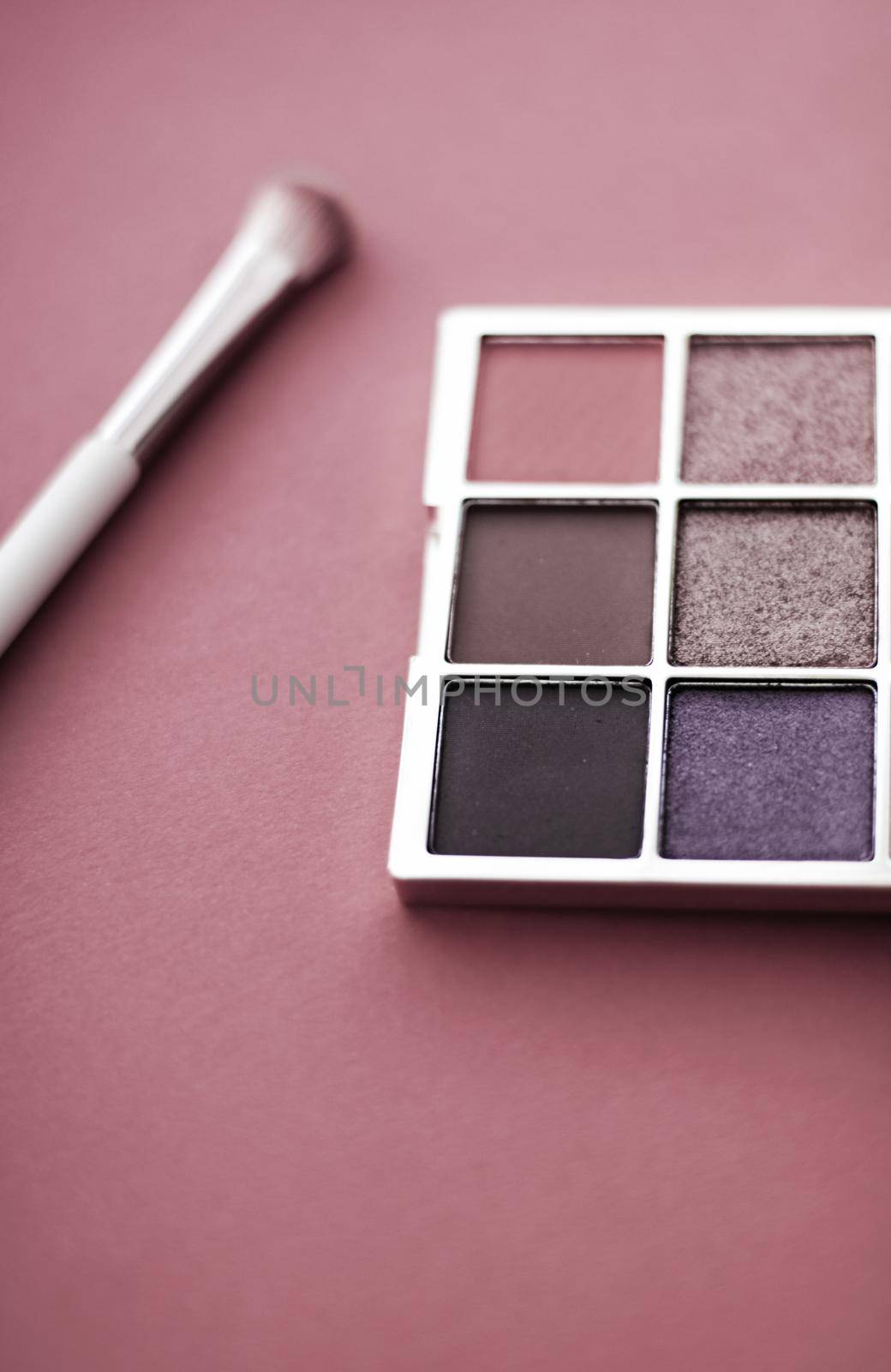 Cosmetic branding, mua and girly concept - Eyeshadow palette and make-up brush on rouge background, eye shadows cosmetics product for luxury beauty brand promotion and holiday fashion blog design