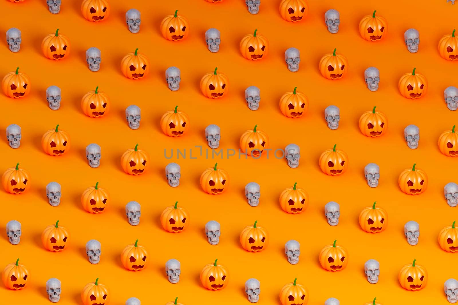 3d isometric illustration pattern of many Halloween pumpkin and white skulls on orange background. by Antonelli