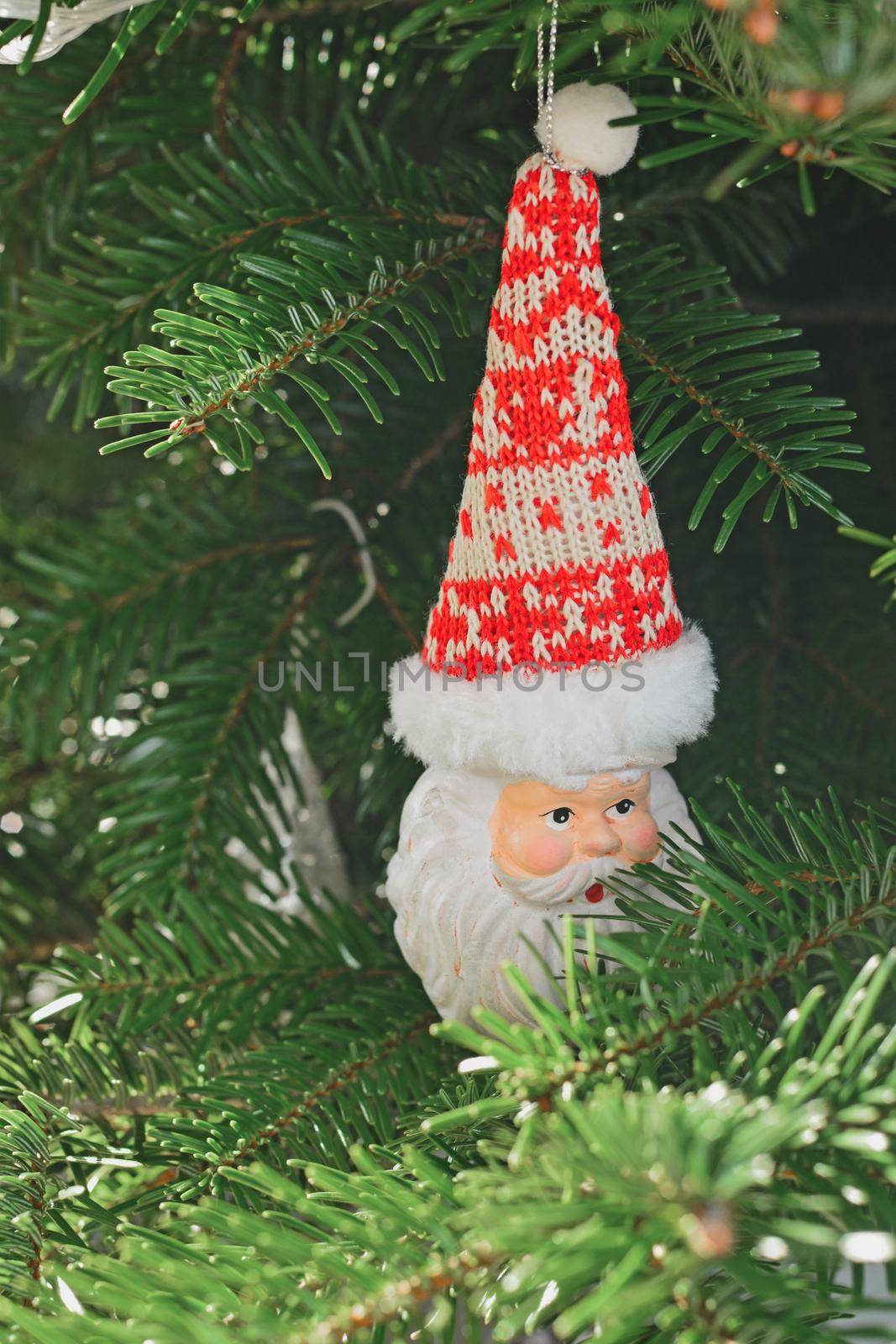 Ceramic Christmas toy Santa Claus hanging on the Christmas tree